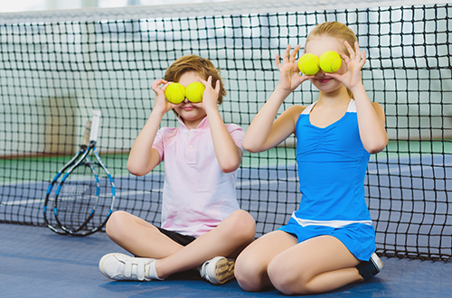 Kids playing using tennis balls
